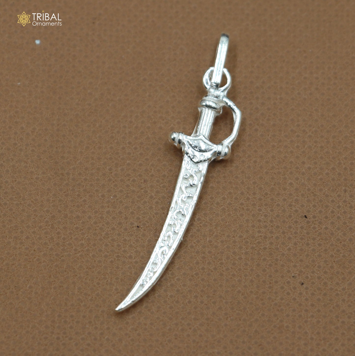 925 sterling silver small sword pendant, unisex dagger jewelry by TRIBAL ORNAMENTS, detailed blade and hilt design.