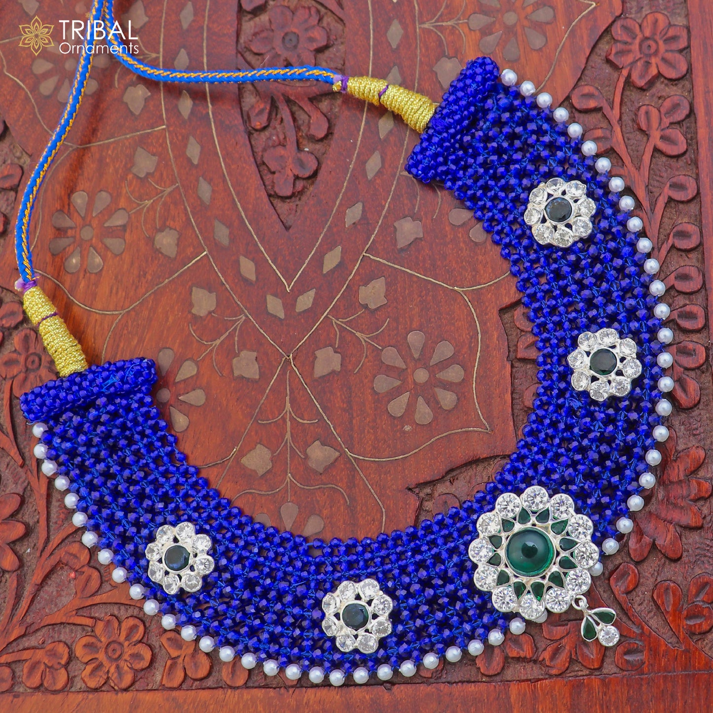 Silver blue Indian traditional choker necklace set with intricate cultural design by TRIBAL ORNAMENTS, displayed on a neutral background.