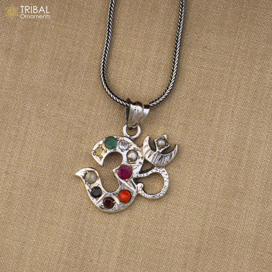 Sterling silver Navaratnam style Om pendant by TRIBAL ORNAMENTS featuring intricate design and traditional jewelry craftsmanship.