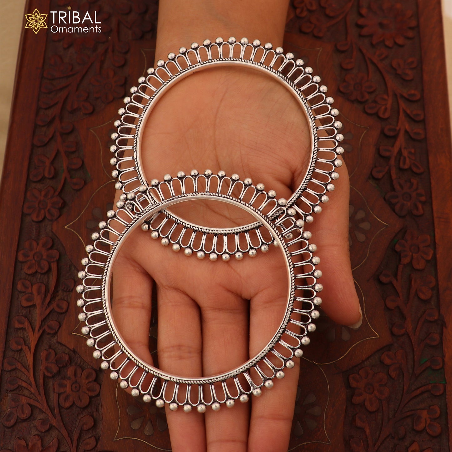 Sterling silver sun-inspired bangle Kada by TRIBAL ORNAMENTS, featuring ethnic jewelry design with intricate craftsmanship.