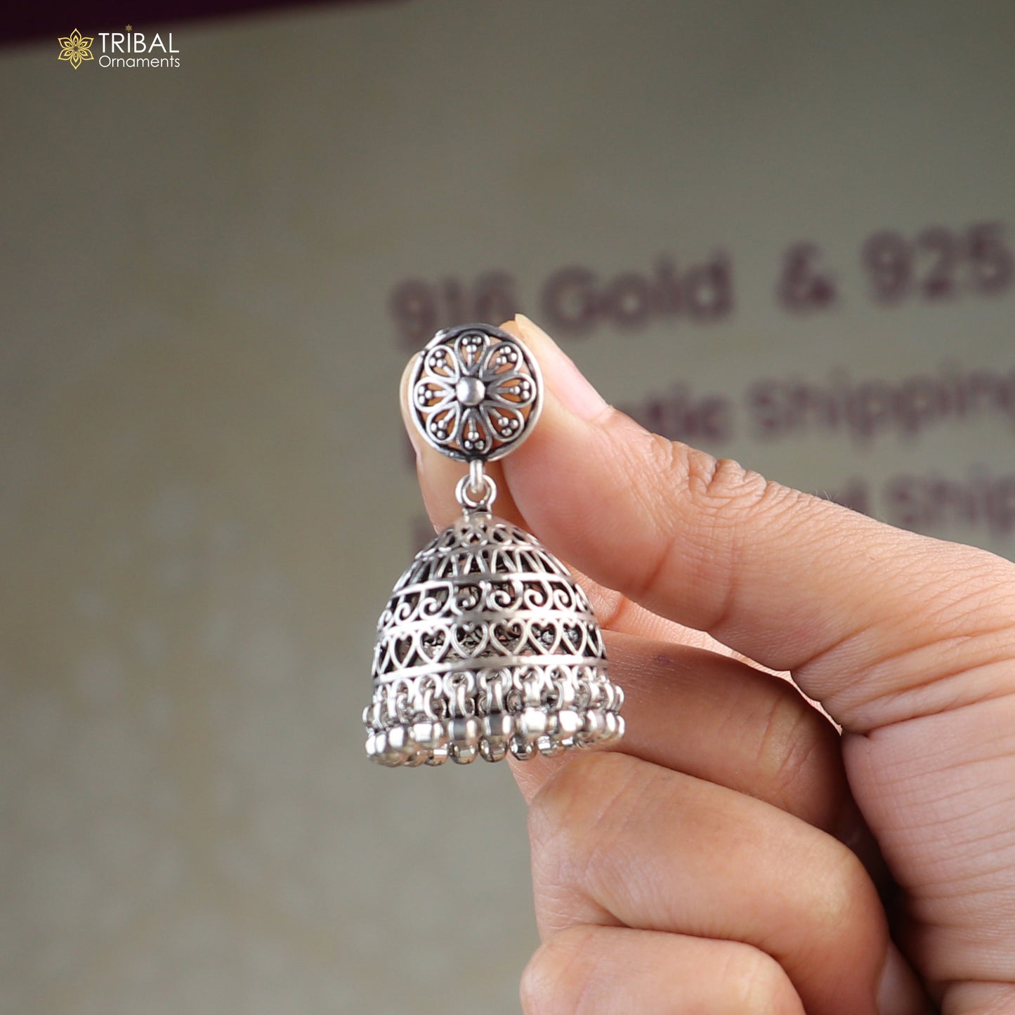 Sterling silver vintage floral jumka earring with oxidized finish and intricate design, by TRIBAL ORNAMENTS.