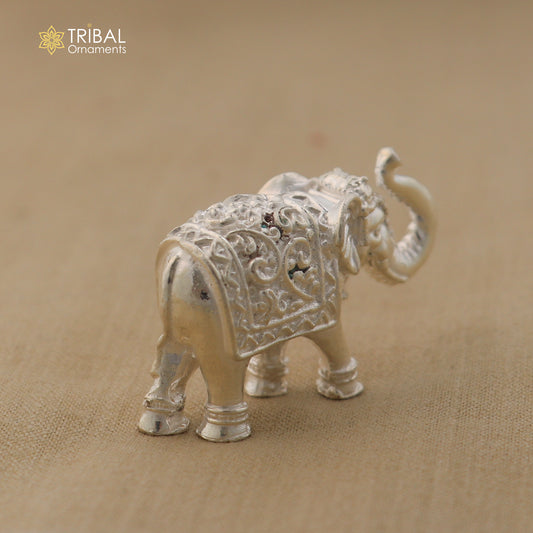 925 Sterling silver elephant statue sculpture by TRIBAL ORNAMENTS, detailed puja figurine symbolizing wealth and prosperity.