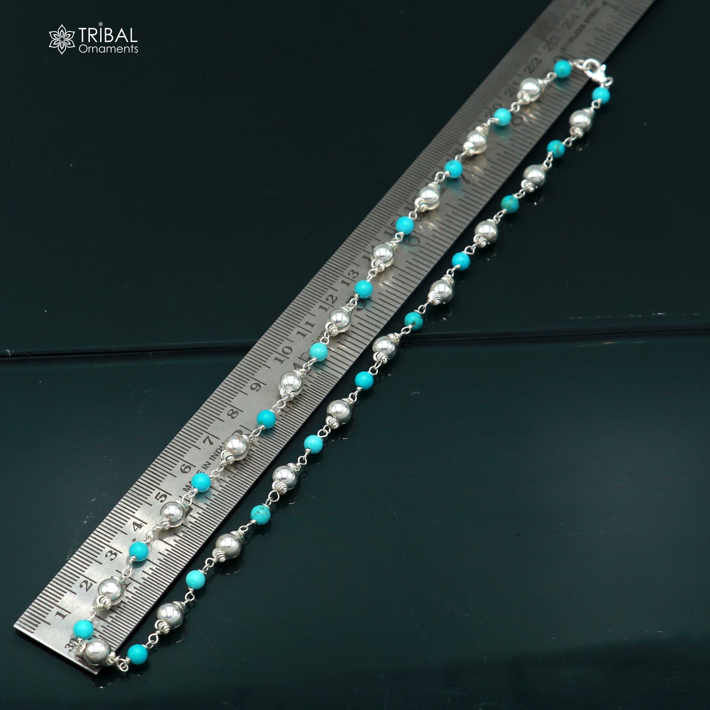 Sterling silver and turquoise beaded necklace with round stones, featuring tribal-inspired design by TRIBAL ORNAMENTS.