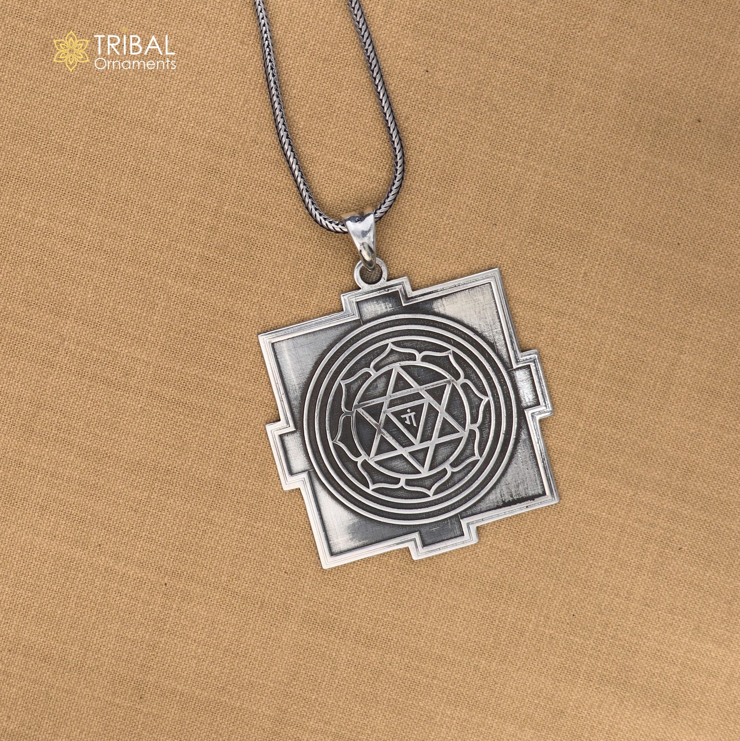 925 sterling silver Divine Shree Ganesha Yantram pendant featuring tribal design, showcasing intricate craftsmanship and spiritual symbolism.