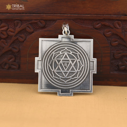 925 sterling silver Divine Shree Ganesha Yantram pendant with tribal design, showcasing intricate craftsmanship and spiritual symbolism.