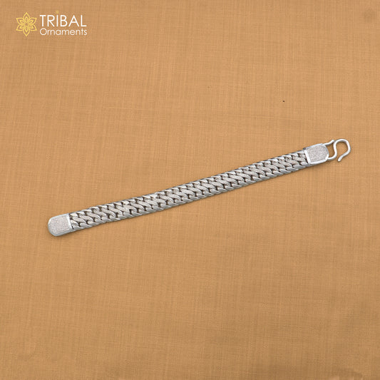 Sterling silver men's bracelet with customized design from TRIBAL ORNAMENTS, featuring personalized royal jewelry style.