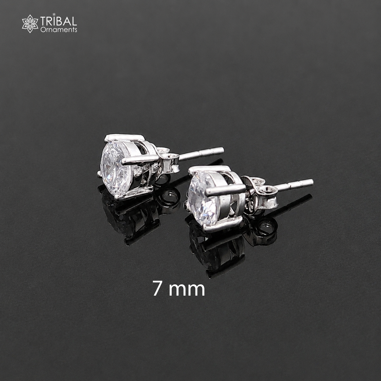Sterling silver round white diamond stud earring by TRIBAL ORNAMENTS, unisex jewelry with sparkling gemstone and sleek design