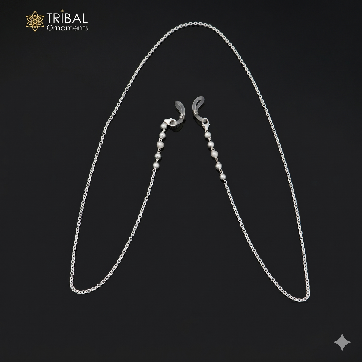 Sterling silver Cuban link chain by TRIBAL ORNAMENTS, styled as a fashionable sunglass or mask chain for women.