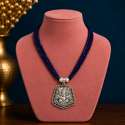 Sterling silver Ganesha pendant with purple navy jade beads on an adjustable tribal necklace, part of tribal jewelry set.