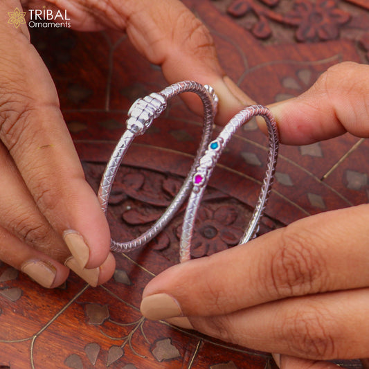 Sterling silver baby bangle for kids by TRIBAL ORNAMENTS, stylish and delicate jewelry with intricate design.