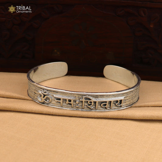 Sterling silver Om Namah Shivay mantra cuff bracelet for men, tribal style jewelry with engraved design.