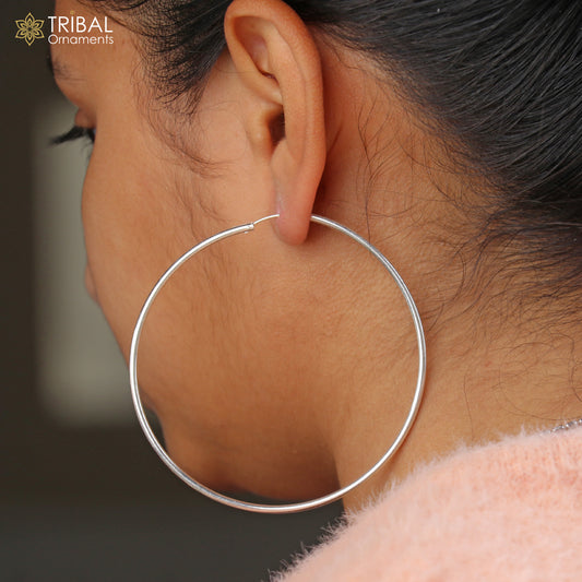Elegant 925 sterling silver round hoops earrings featuring a polished finish, from TRIBAL ORNAMENTS jewelry collection.