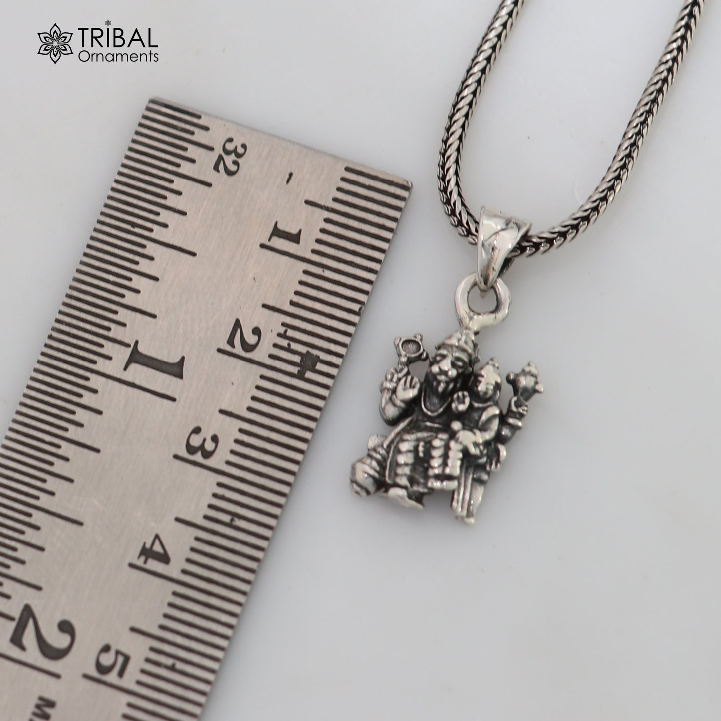925 silver Narsimha and Prahlad pendant with chain, tribal jewelry by TRIBAL ORNAMENTS, featuring detailed religious design.