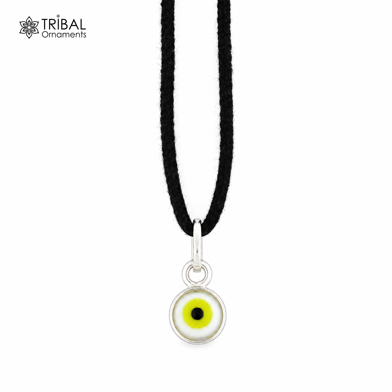 Sterling silver evil eye pendant for girls and kids, protective jewelry by TRIBAL ORNAMENTS, featuring a blue and white eye design.