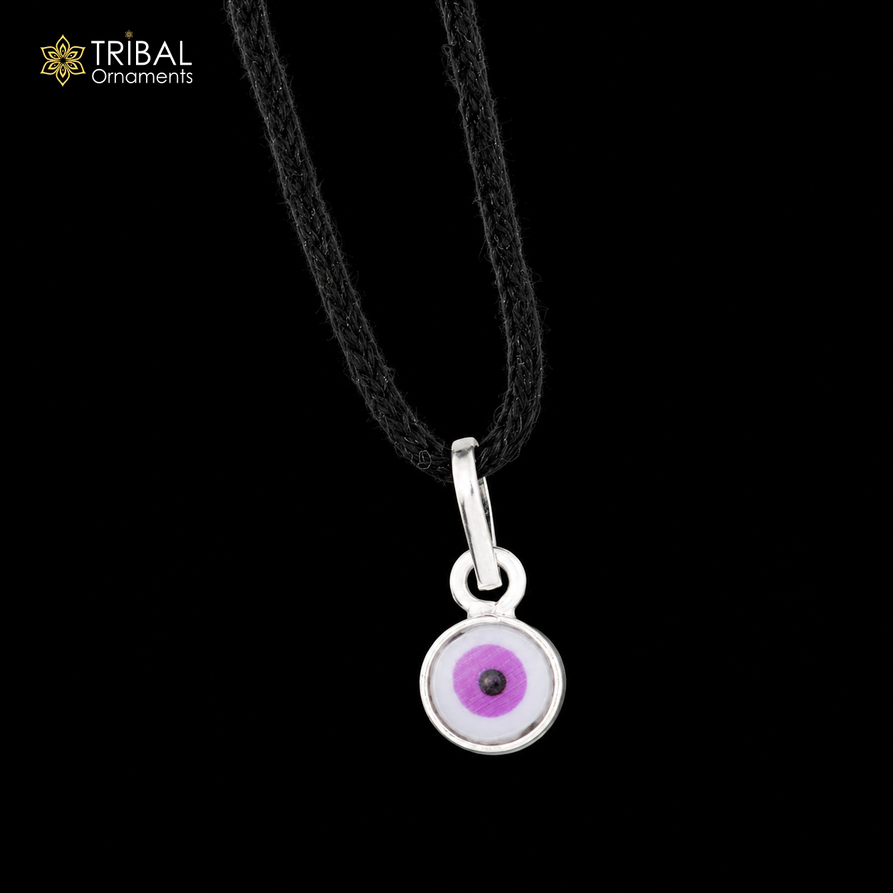 Sterling silver evil eye pendant for girls and kids, protective jewelry by TRIBAL ORNAMENTS, featuring a blue and white eye design.
