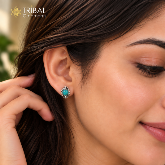 Sterling silver turquoise stone stud earring by TRIBAL ORNAMENTS with a polished gemstone setting.