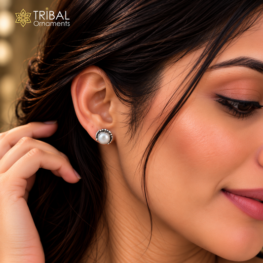 Sterling silver round pearl stud earring by TRIBAL ORNAMENTS, featuring a smooth pearl stone ideal for unisex jewelry.