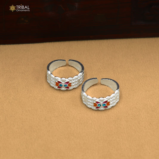 Solid silver Minakari work toe ring with stylish design, women's bridal jewelry, featuring intricate craftsmanship and silver band.