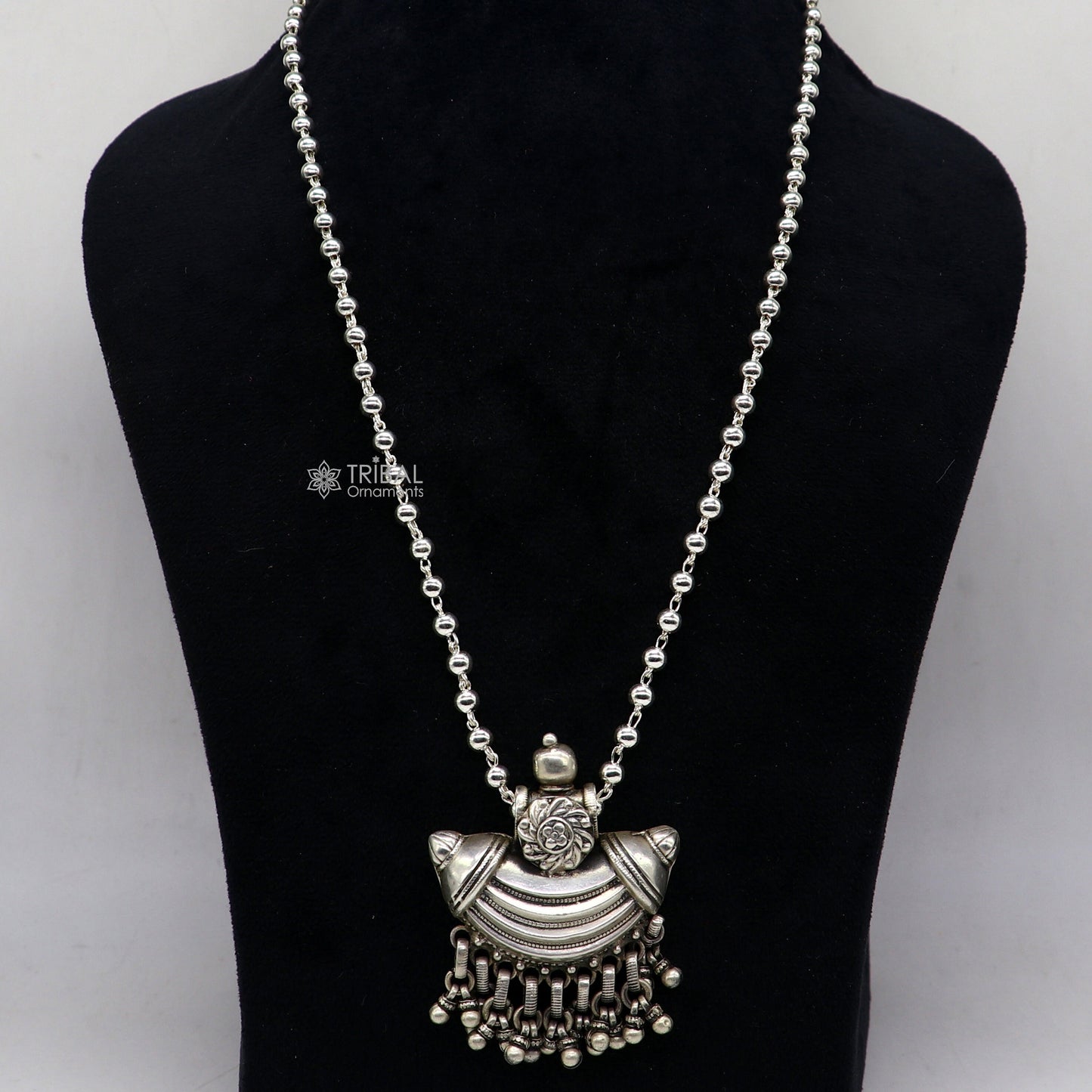 925 sterling silver tribal pendant with ethnic temple design from Indian jewelry, featuring intricate tribal ornament details.