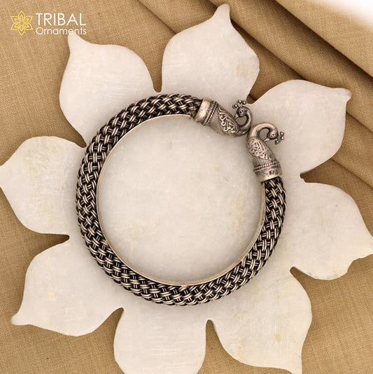 Sterling silver handmade vintage peacock design bangle bracelet by TRIBAL ORNAMENTS, unisex, customizable hip-hop jewelry.