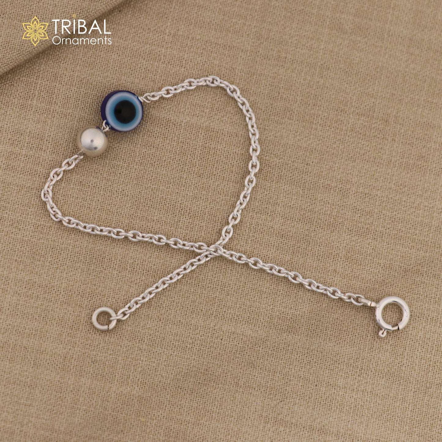 Silver evil eye bracelet in 925 sterling silver, unisex chain jewelry featuring a protective eye design.