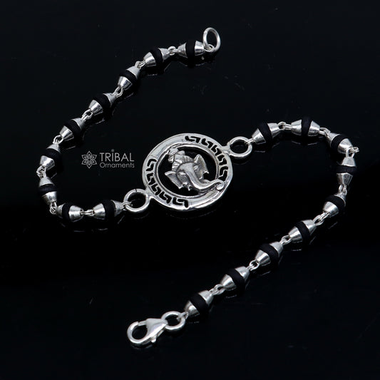 925 sterling silver handmade Lord Ganesha holy basil rosary beads bracelet with black Tulsi beads, crafted by TRIBAL ORNAMENTS.