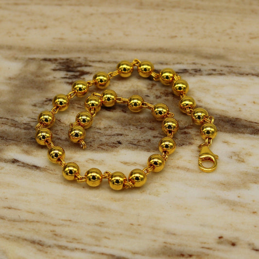 925 Sterling silver beaded bracelet with gold polish, handmade unisex jewelry by TRIBAL ORNAMENTS, stylish and customizable gift accessory.