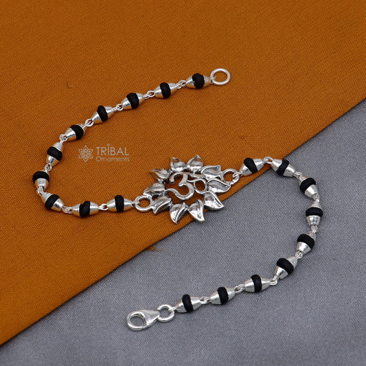 925 sterling silver Om design Shiva mantra bracelet with black Tulsi beads, handmade tribal ornament jewelry with holy basil accents.