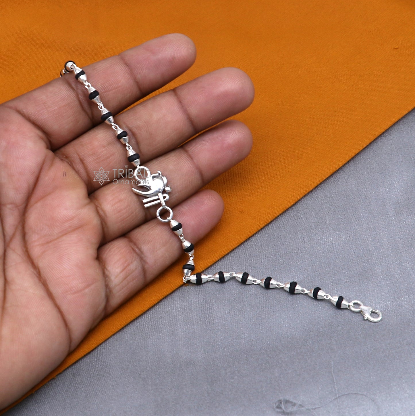 925 sterling silver handmade Shree Ganesha holy basil rosary beads bracelet with black Tulsi beads by TRIBAL ORNAMENTS.