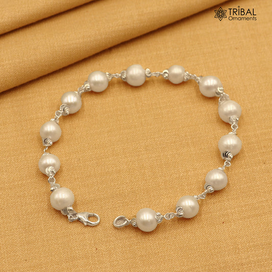 925 Sterling silver pearl beads bracelet for unisex jewelry by TRIBAL ORNAMENTS, featuring a 6-inch silver bracelet with pearl accents.