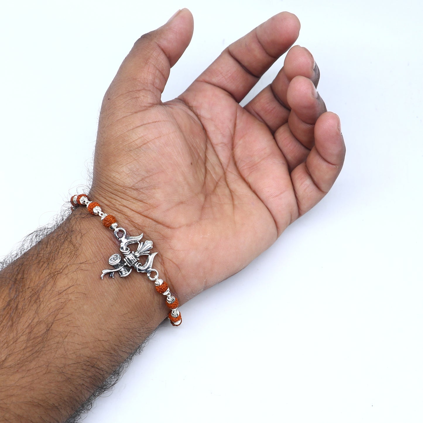 925 Sterling silver Rudraksha beaded Lord Shiva trident bracelet with intricate details, designed by TRIBAL ORNAMENTS.