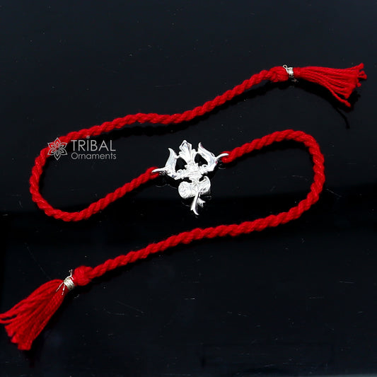 925 sterling silver Trishul bracelet with trident design, featuring thread rakhi style, by TRIBAL ORNAMENTS for Rakshabandhan festival.