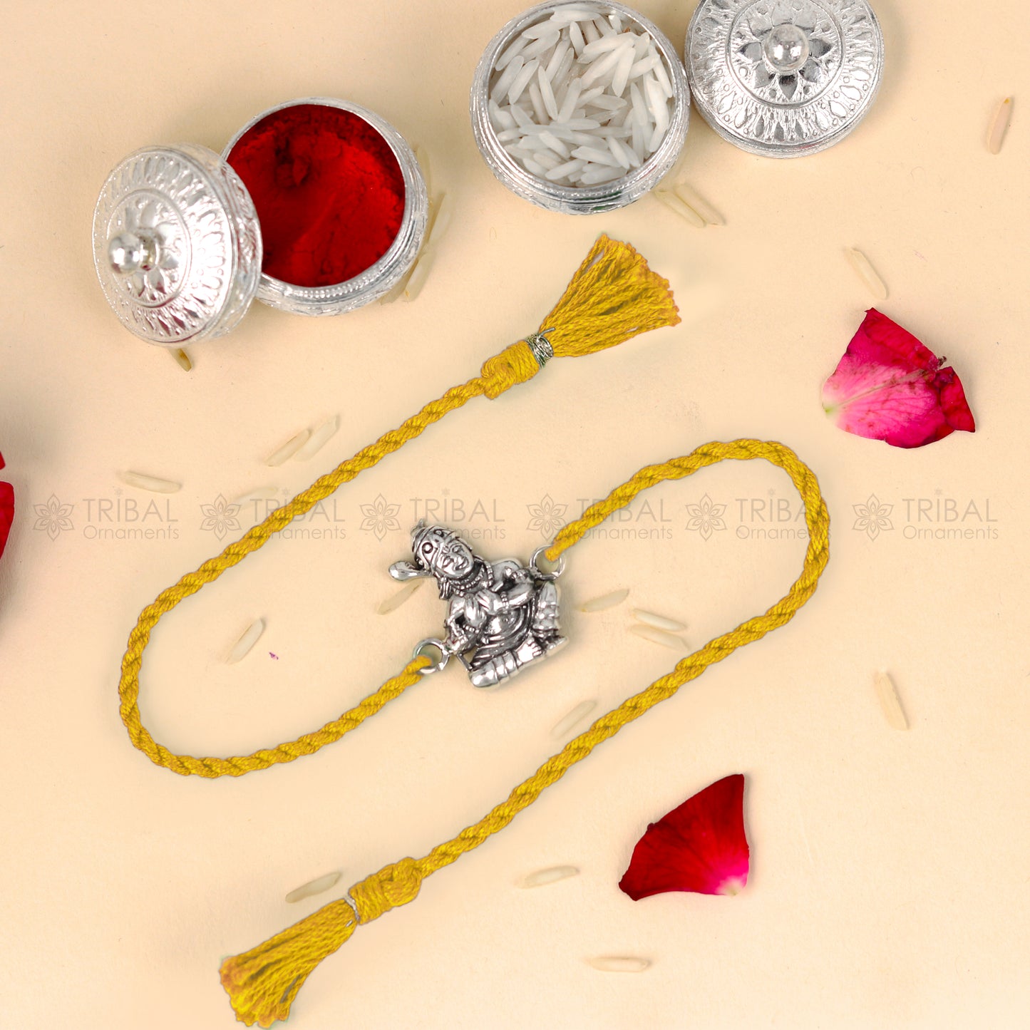 925 Sterling silver Bal Krishna design thread bracelet with red thread from TRIBAL ORNAMENTS, featuring intricate Bal Krishna pendant design.
