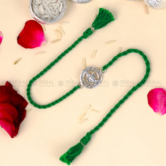 925 Sterling silver Ganesha design thread bracelet with red thread and pendant, crafted by TRIBAL ORNAMENTS.