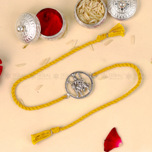 925 Sterling silver Lord Bhawani Maa Duga Maa pendant bracelet with red thread from TRIBAL ORNAMENTS, featuring intricate religious design.