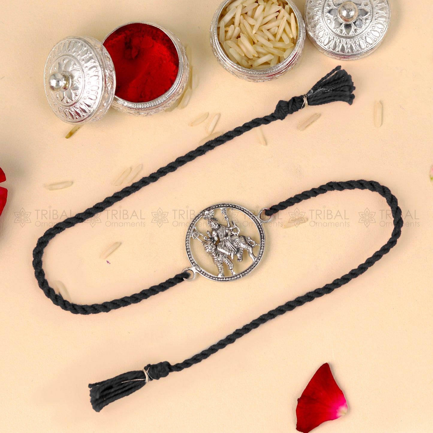 Sterling silver Lord Bhawani Maa Duga Maa design thread rakhi bracelet with red thread by TRIBAL ORNAMENTS.