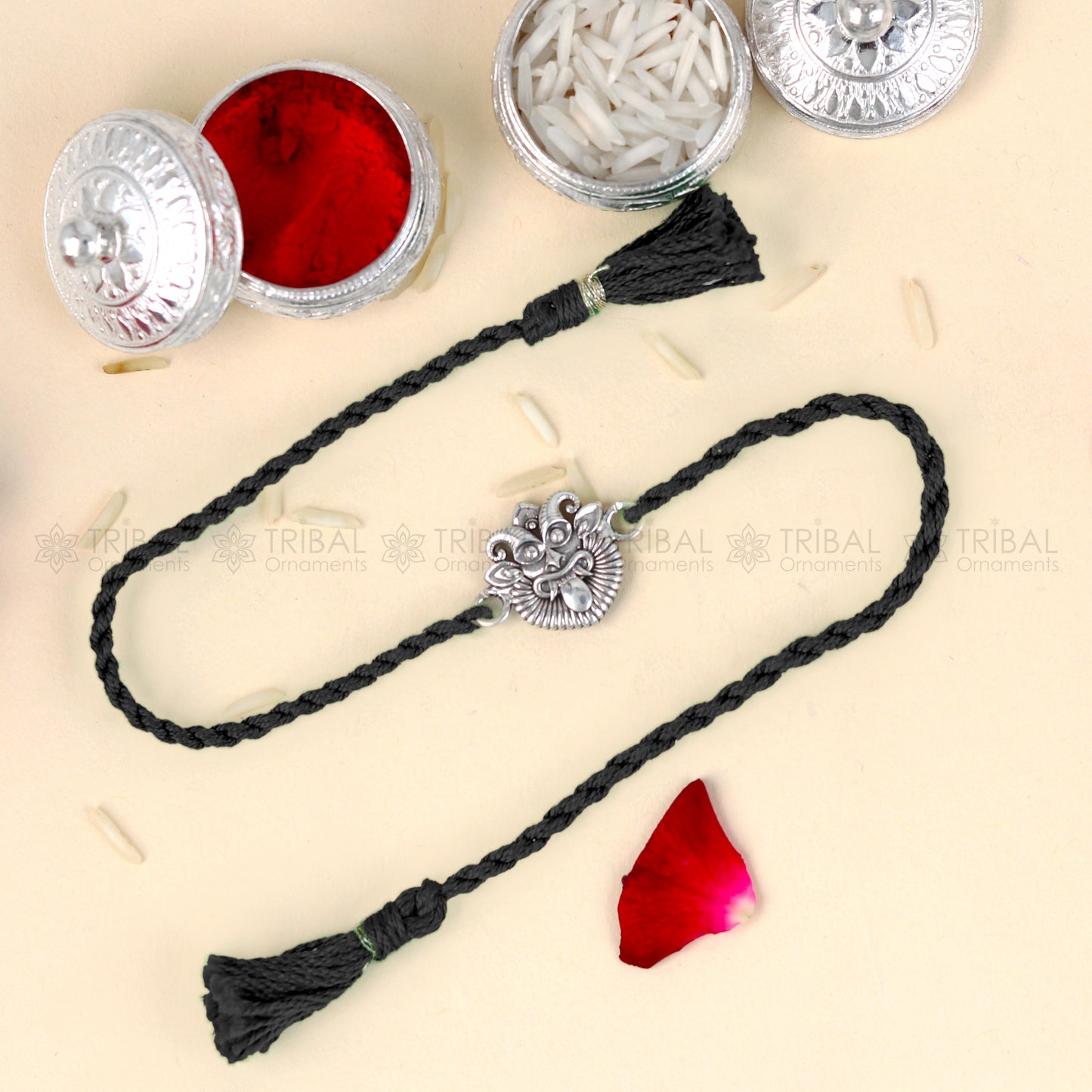 925 Sterling silver rakhi bracelet with a red thread and Nazar Battu design pendant by TRIBAL ORNAMENTS