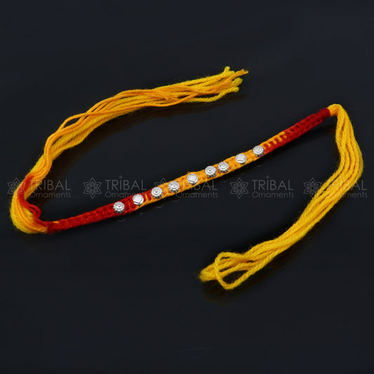 925 sterling silver rakhi bracelet with unique thread design and pendant from TRIBAL ORNAMENTS for Rakshabandhan festival.