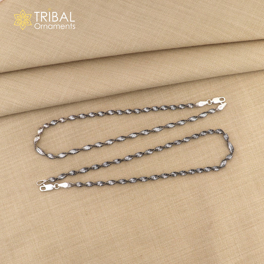 Sterling silver 10.5-inch twisting chain anklet bracelet by Tribal Ornaments, lightweight and stylish ankle jewelry.