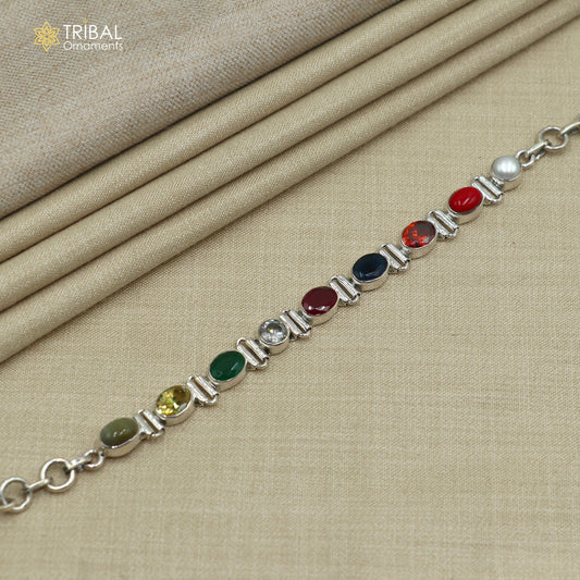 Sterling silver Navratan stone bracelet by TRIBAL ORNAMENTS, unisex jewelry with colorful stones, handcrafted and stylish.