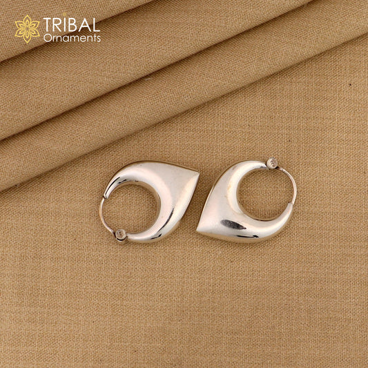 Sterling silver handmade vintage unisex hoop earrings with tribal and ethnic Bali design, crafted by TRIBAL ORNAMENTS.