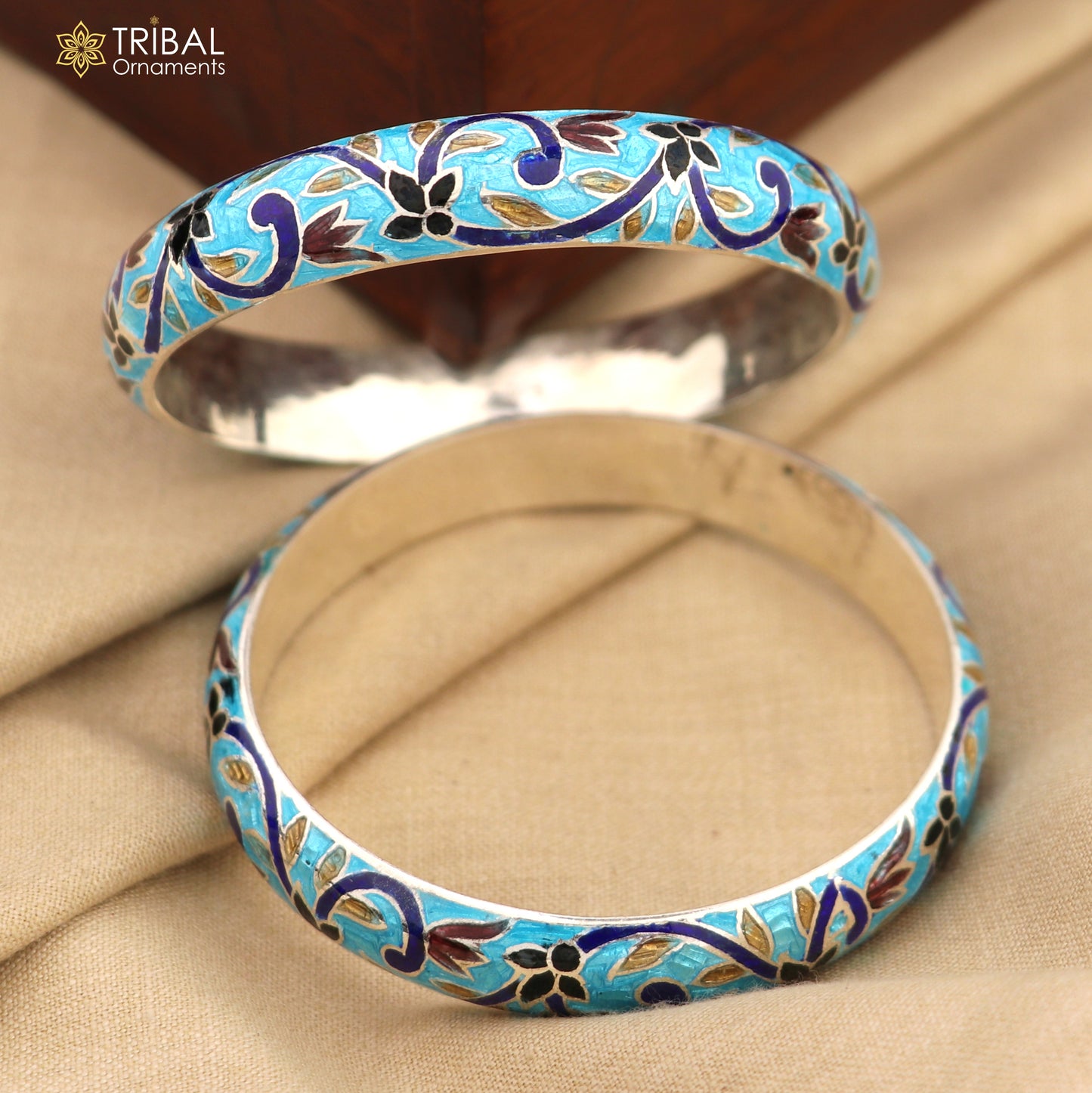 Sterling silver bangles bracelet with colorful enamel flower design, handcrafted tribal jewelry for vintage-style wrist accessories.