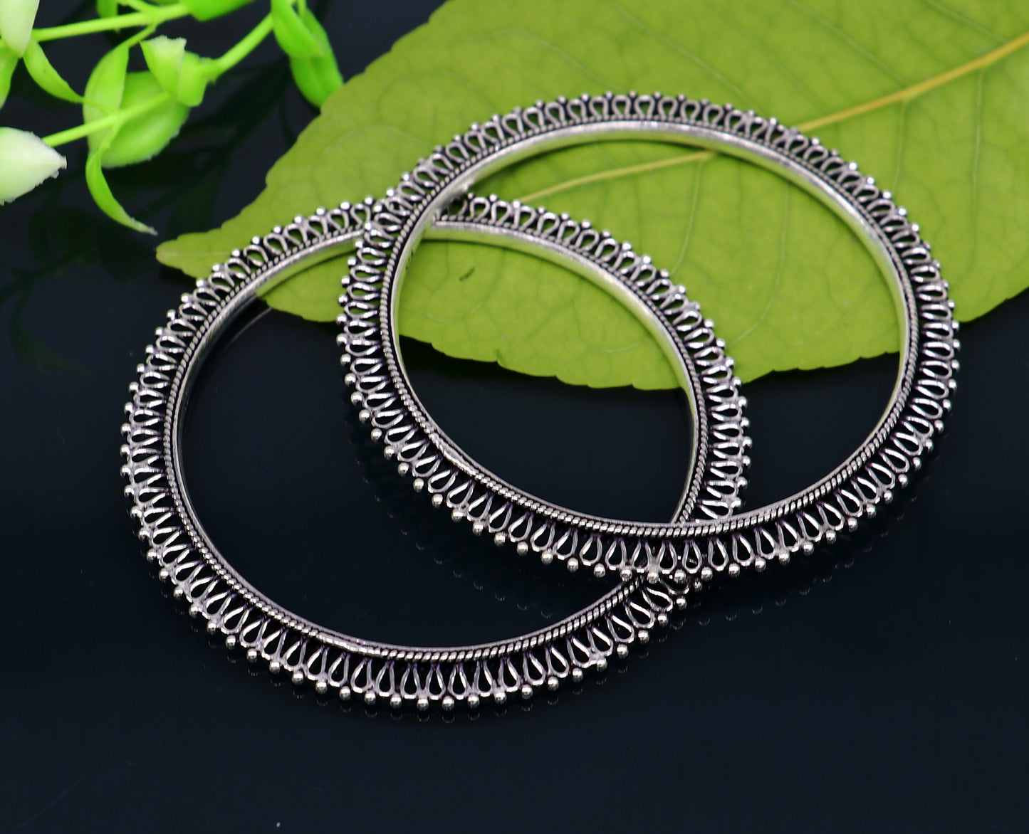 Sterling silver bangle and kada kangan set for brides, handcrafted tribal jewelry for women, featuring intricate designs and a stunning finish.