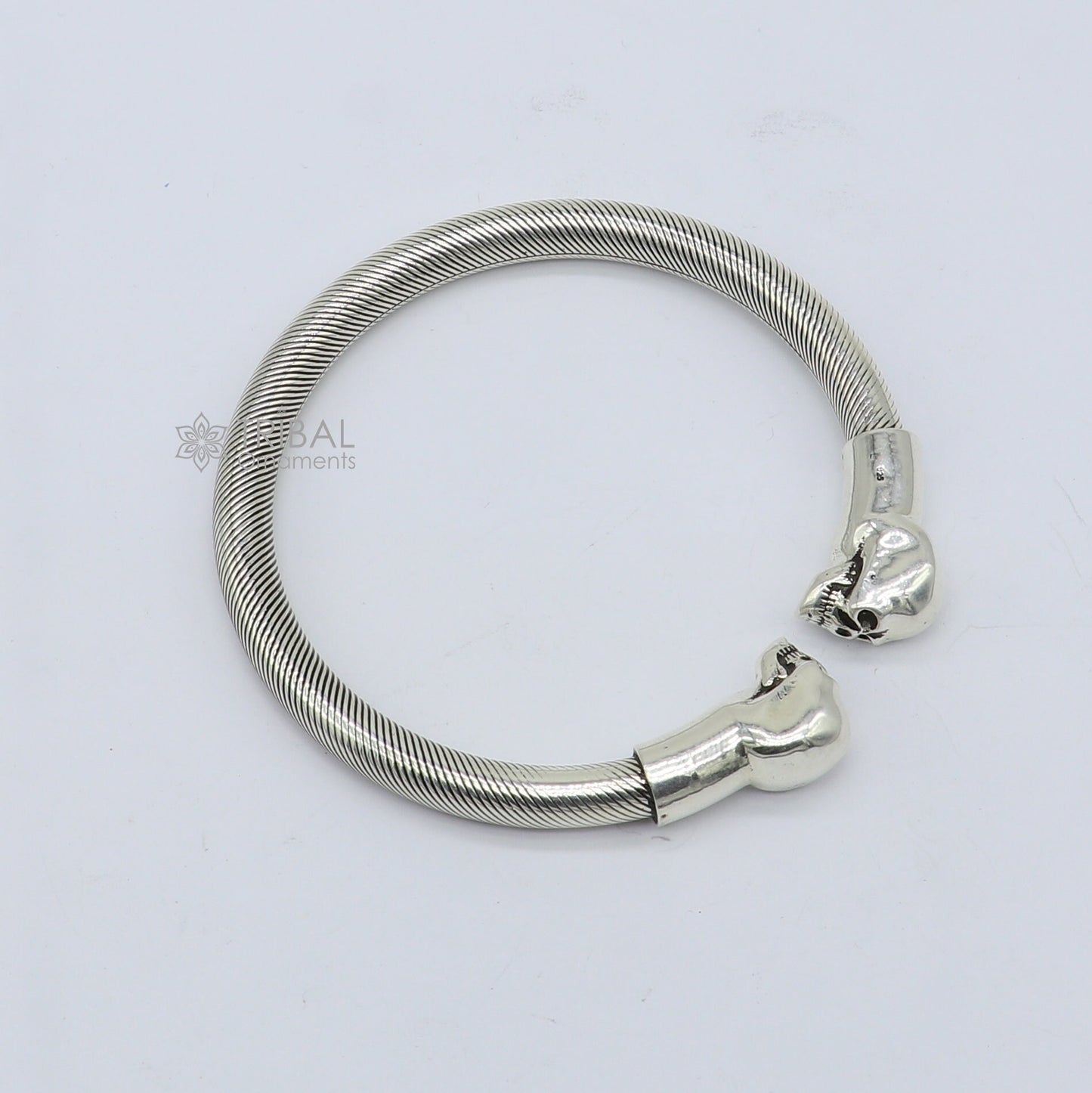 Sterling silver human skull design bangle cuff bracelet for unisex, handmade tribal ornament jewelry.
