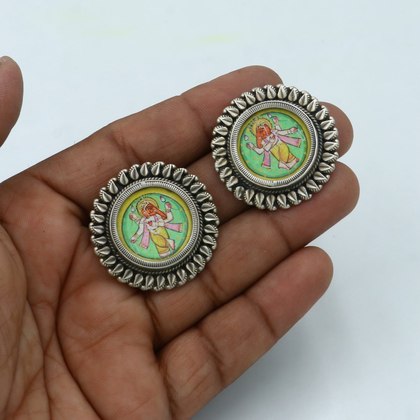 Sterling silver Lord Ganesha miniature painting hoops earrings by TRIBAL ORNAMENTS, featuring detailed Ganesha artwork in silver.