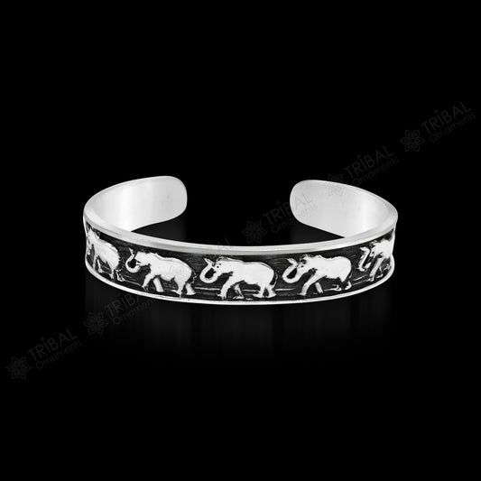 Unisex 925 sterling silver adjustable cuff bracelet with handcrafted elephant tribal design, tribal jewelry by TRIBAL ORNAMENTS.