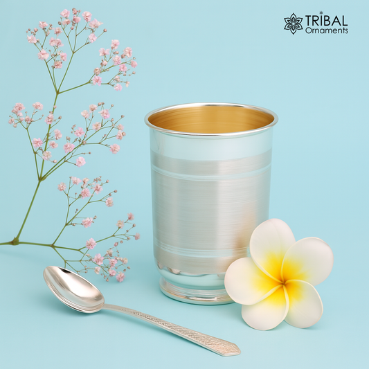 Handmade 999 fine silver water and milk tumbler, silver flask, and kids silver cup with spoon from Tribal Ornaments.