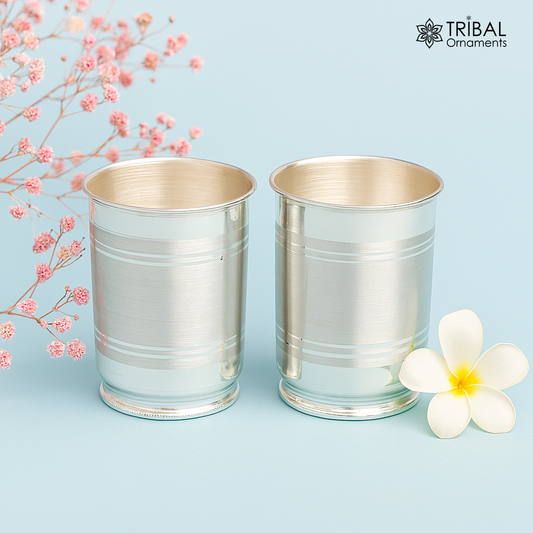 Handmade 999 silver baby glass set with tumblers for water and milk, including silver vodka and wine glasses, detailed craftsmanship.