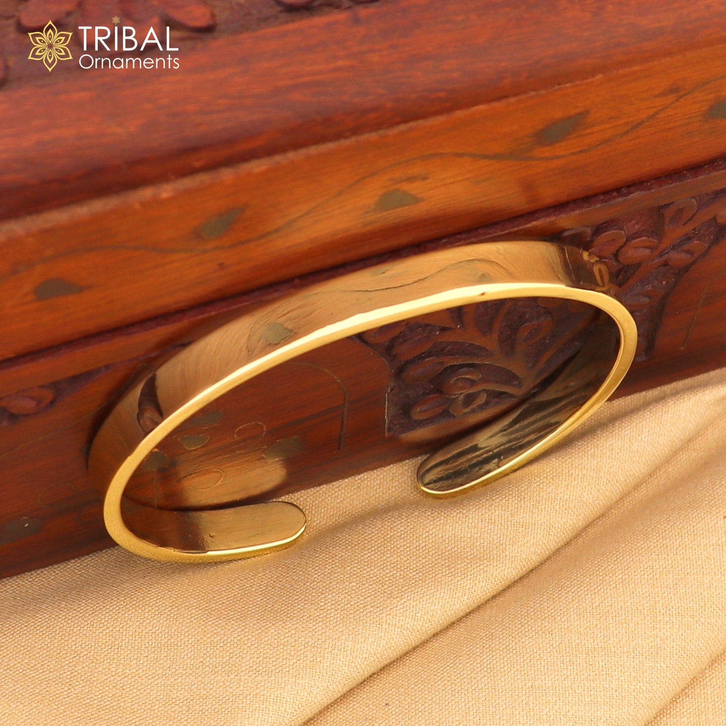 Shiny plain Ashtdhatu cuff kada bracelet by Tribal Ornaments, unisex jewelry with a sleek, polished finish.