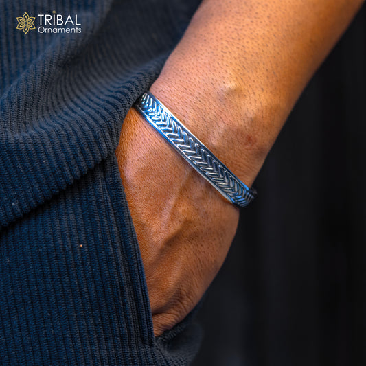 Sterling silver Tiger design unisex cuff bracelet by TRIBAL ORNAMENTS, adjustable handmade silver jewelry with intricate tiger motif.